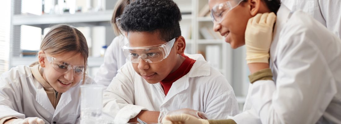 Kids Watching Science Experiment in Lab