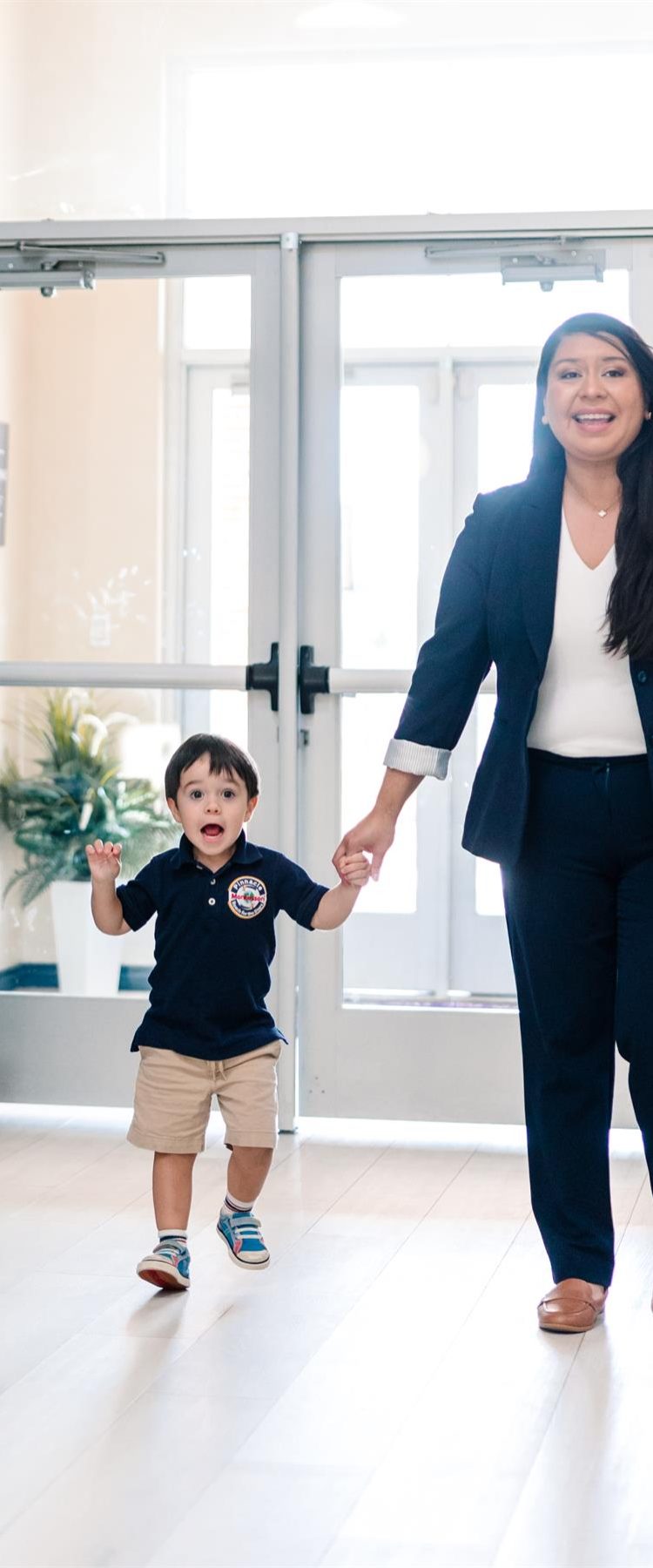 teacher having fun with toddler at Top-Rated Preschool & Childcare