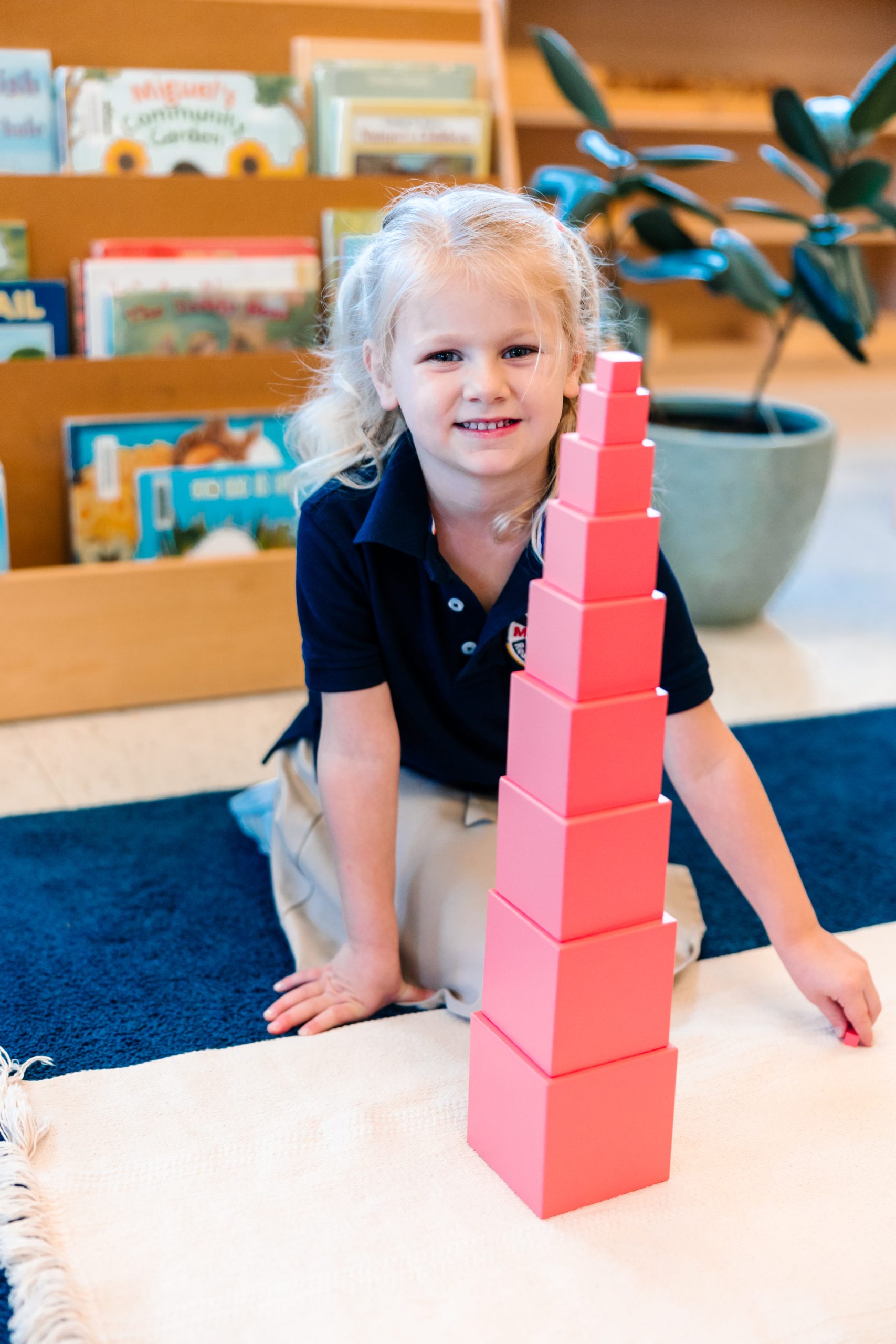 toddler having a good time learning at Primary Montessori School of georgetown
